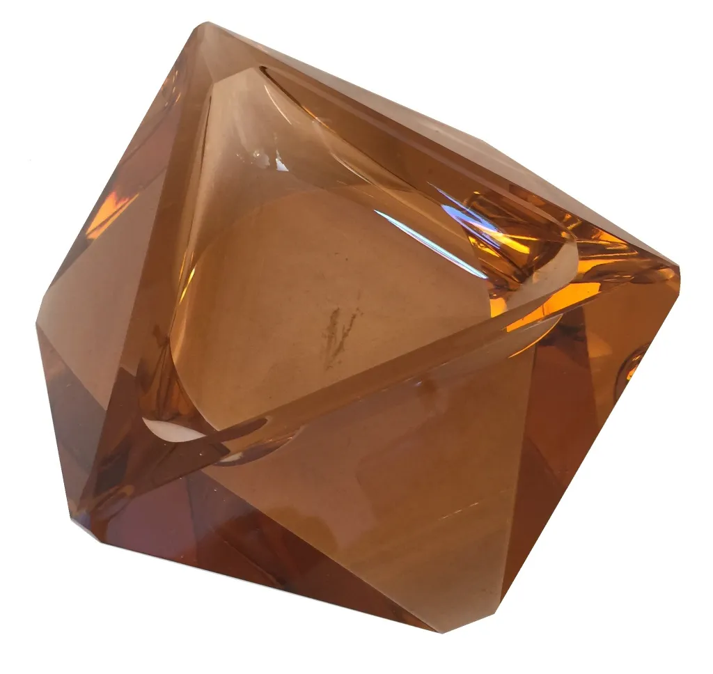 pieza antigua de cristal de murano con tonalidades cálidas