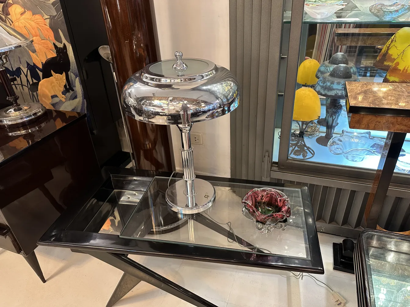 decorative murano glass flower on antique table