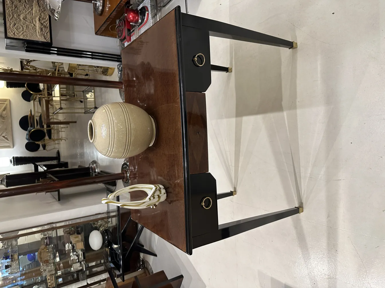 antique table with ceramic vase and elegant decor