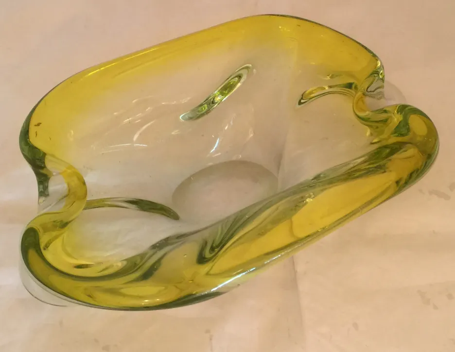 Beautiful antique murano glass with wavy yellow shape