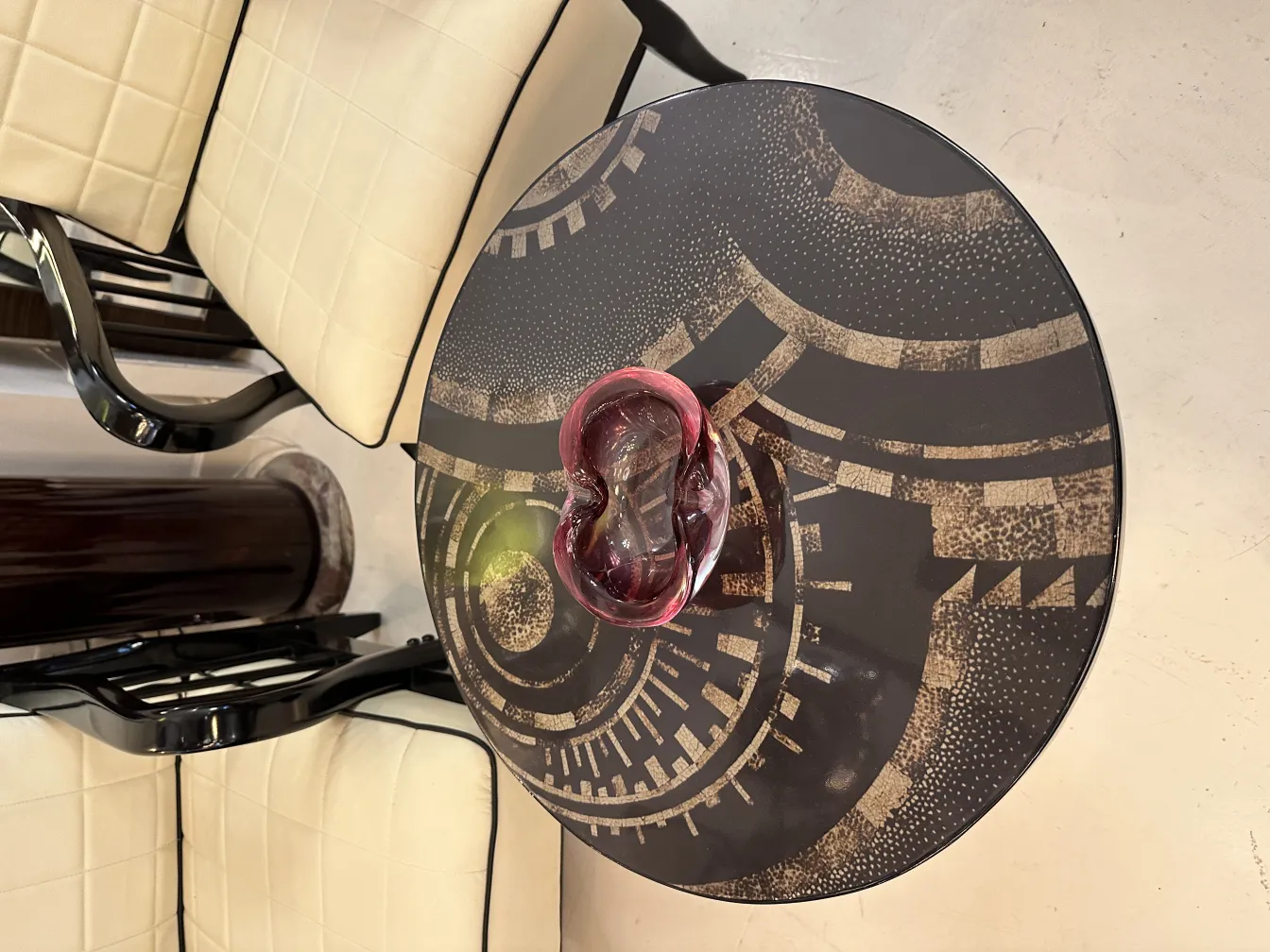 antique murano glass sculpture on dark table