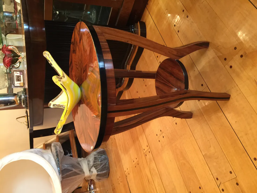 Murano glass sculpture on table, elegant environment.