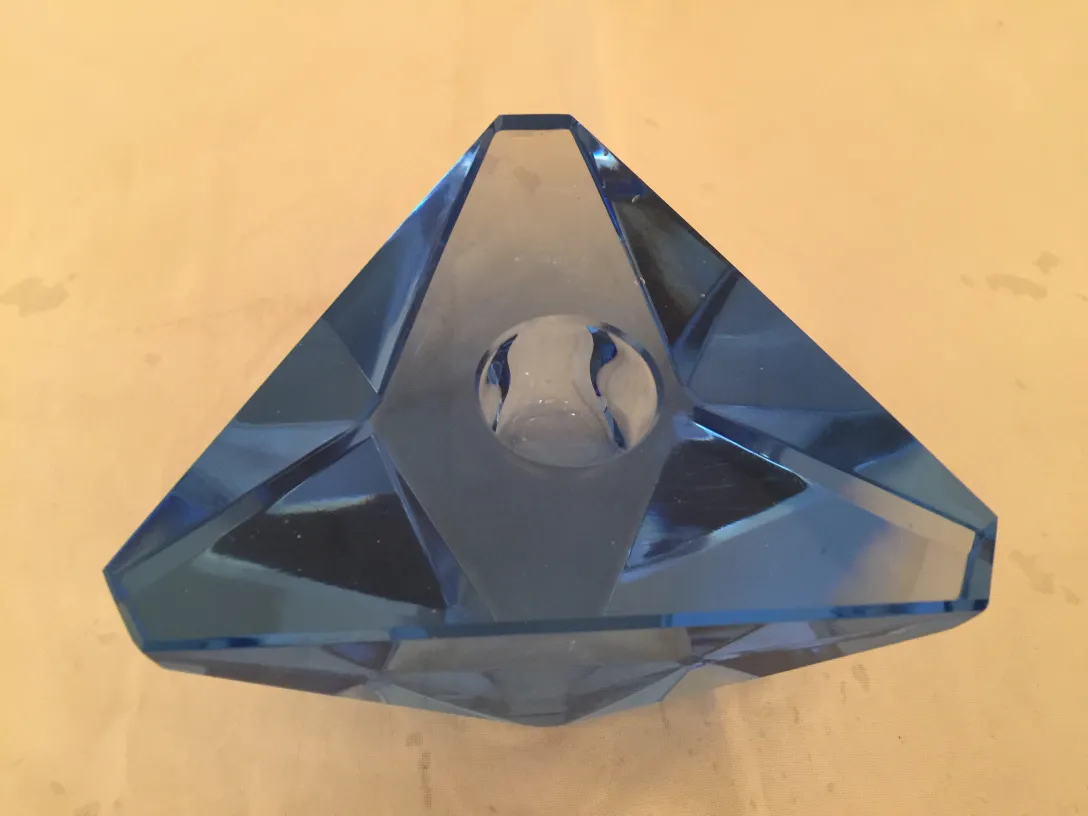 blue murano glass base shaped like a triangle