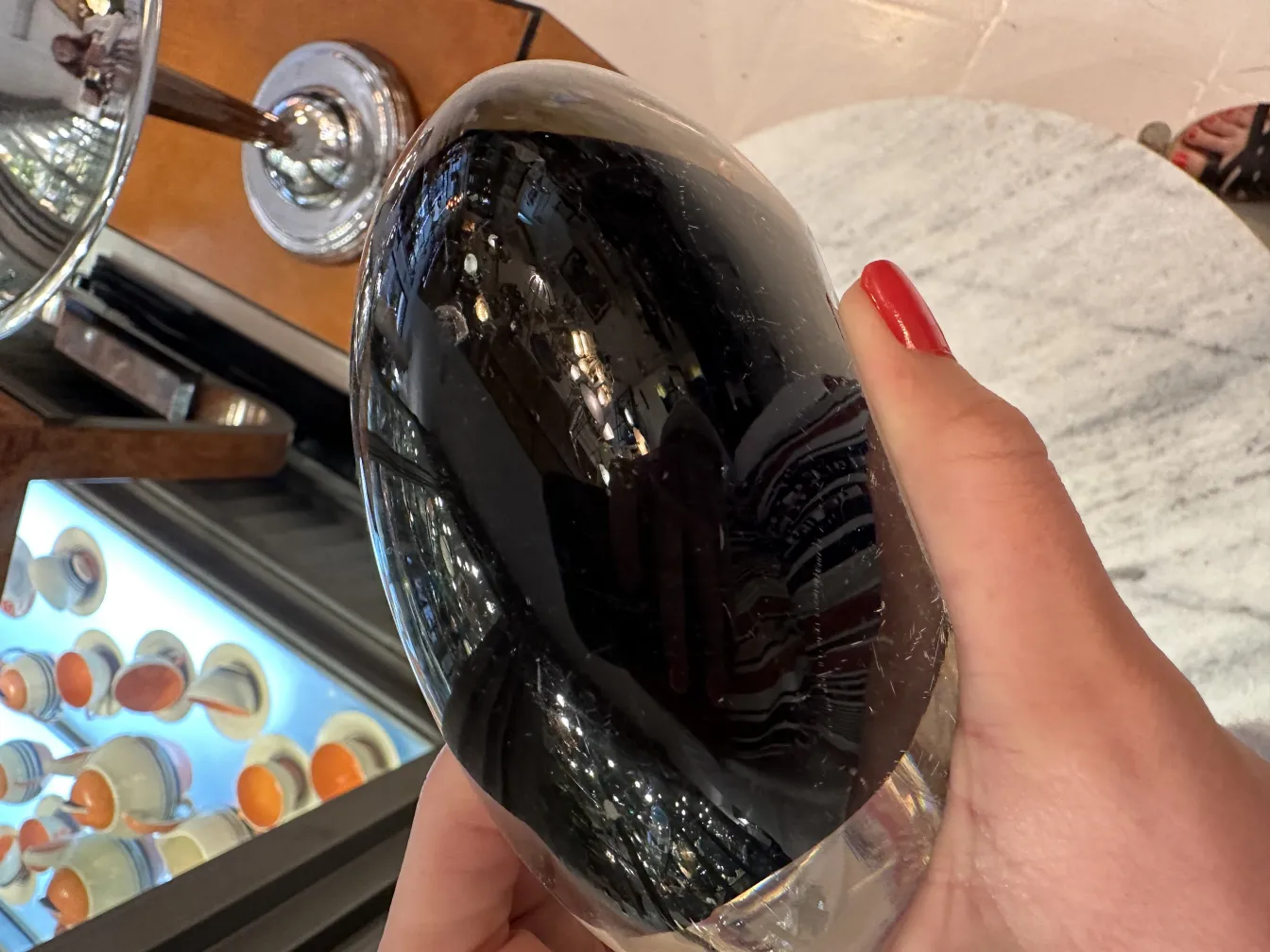 Antique Murano glass oval piece, glossy black color, with a slight shine and surrounding details