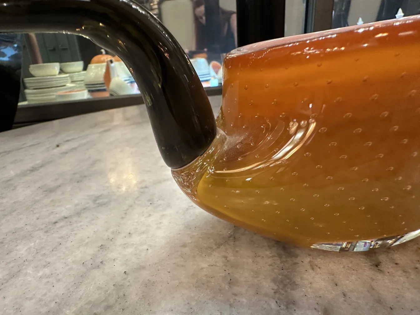 large murano glass vase in amber and black tones