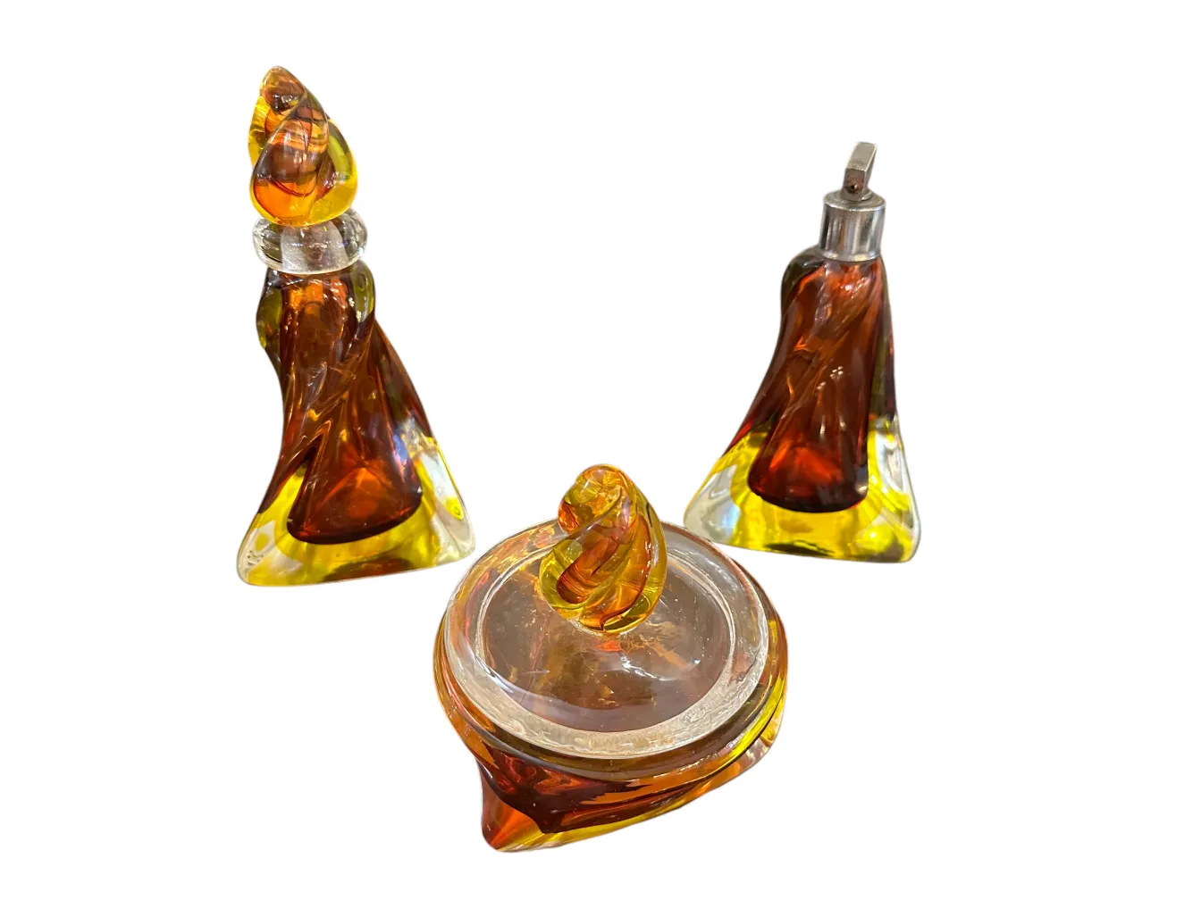 three murano glass pieces in amber and yellow colors