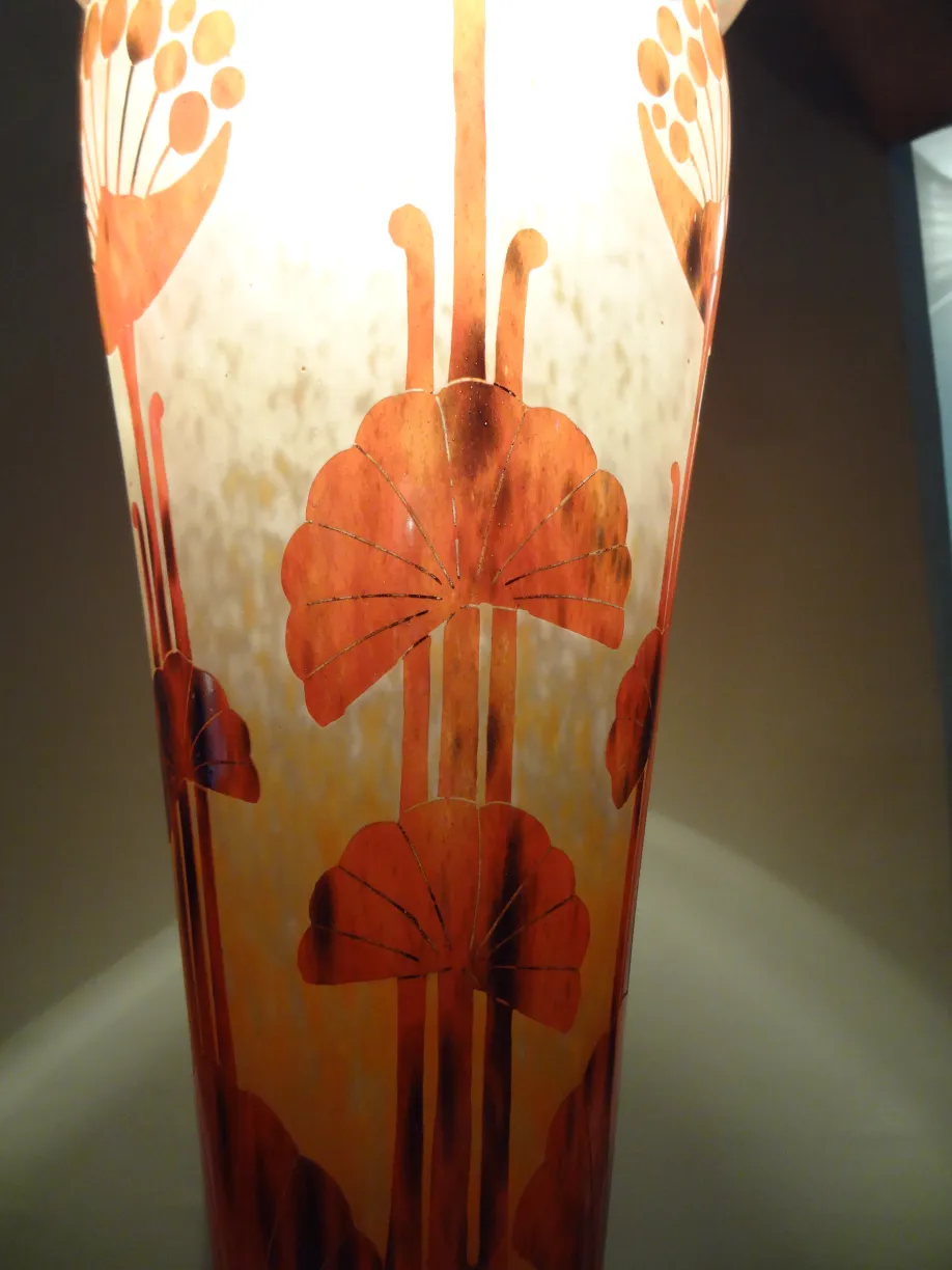 Signed glass with floral decoration in warm tones, antique art.
