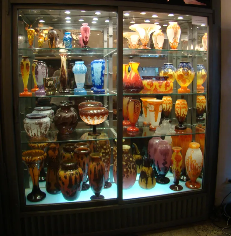 various antique glass vases with colorful designs