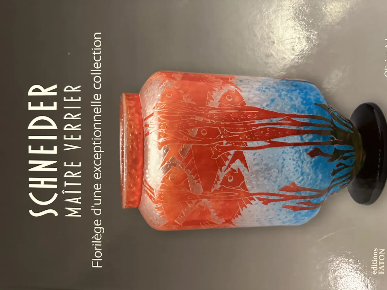 antique glass vase with blue and red design, flowers