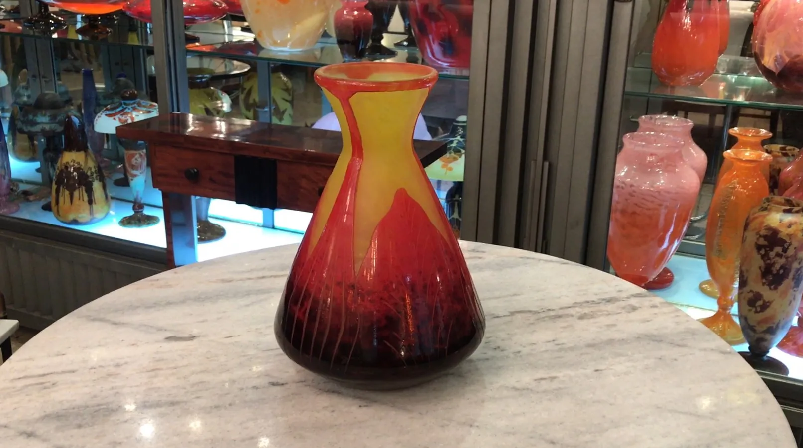 vibrant colored signed glass vase le verre in antique display