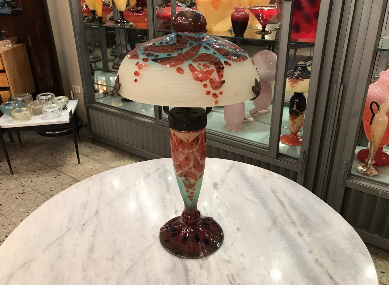 Antique lamp with colorful design in signed glass
