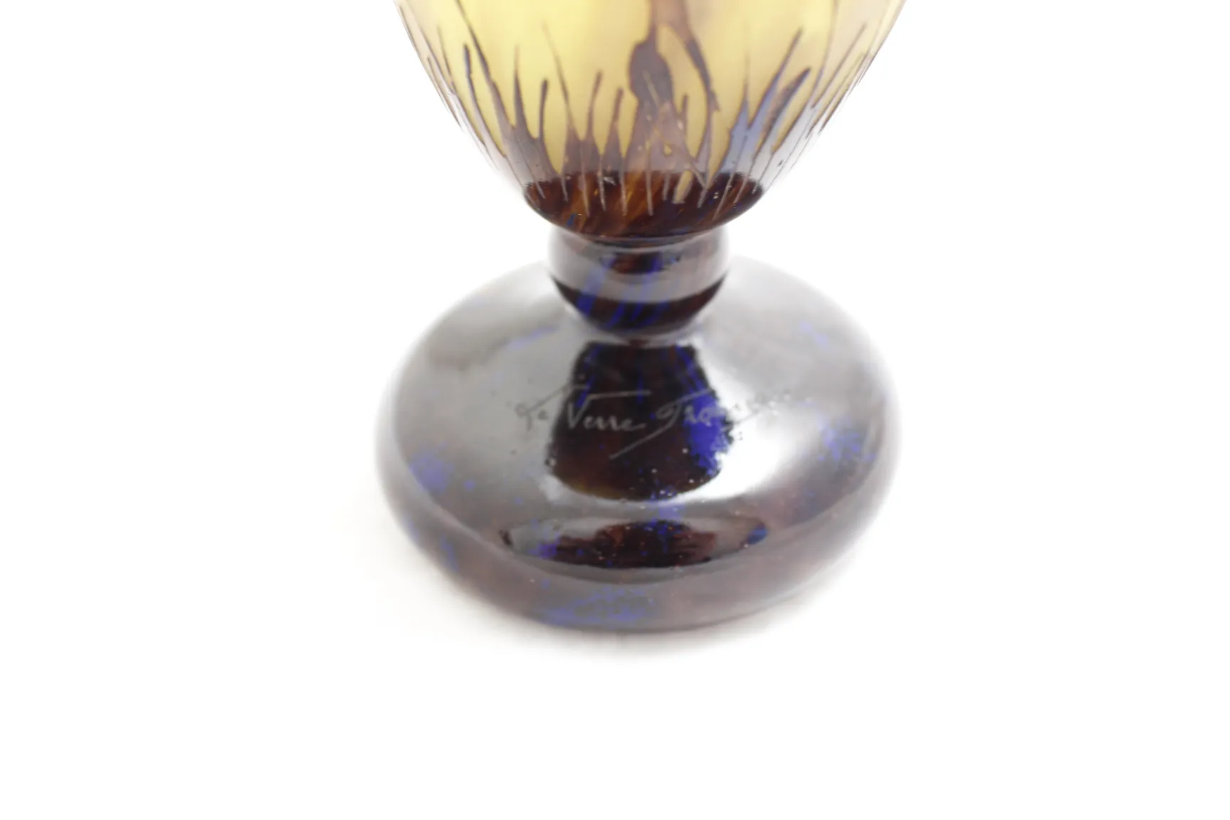 Antique signed glass Le Verre featuring elegant design, light background, and dark base.