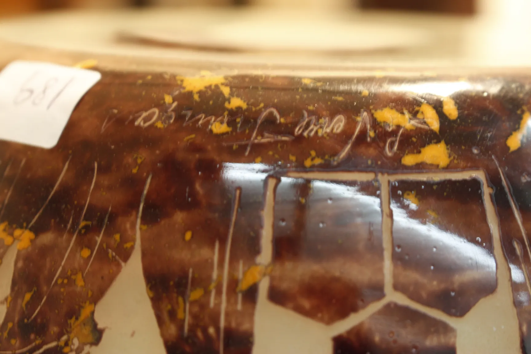 Antique signed glass with clear details and vibrant colors in the environment