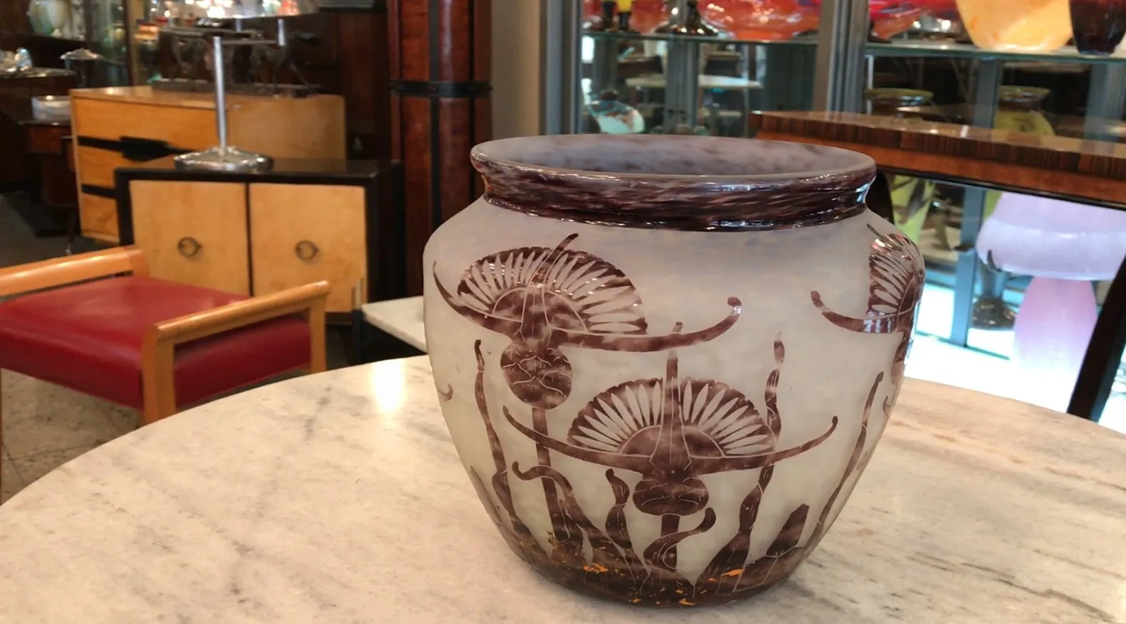 antique glass jar with signatures and floral design, classic environment