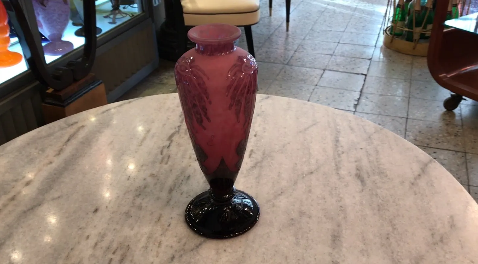 antique glass vase with decorative pink and black details