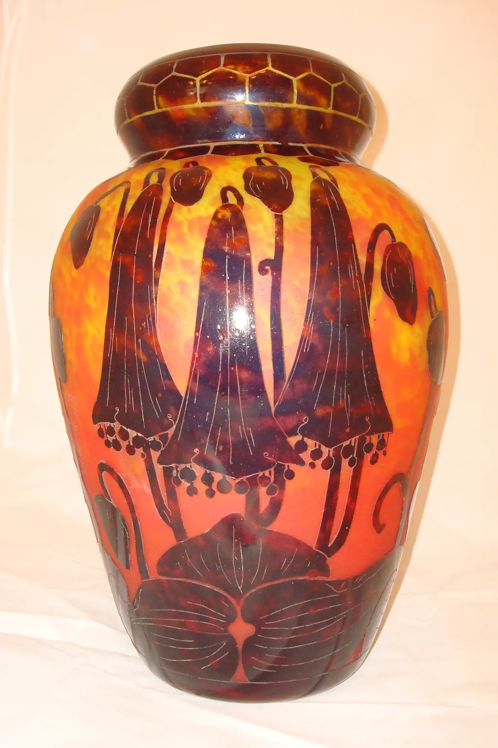 Antique vase painted with vibrant floral designs