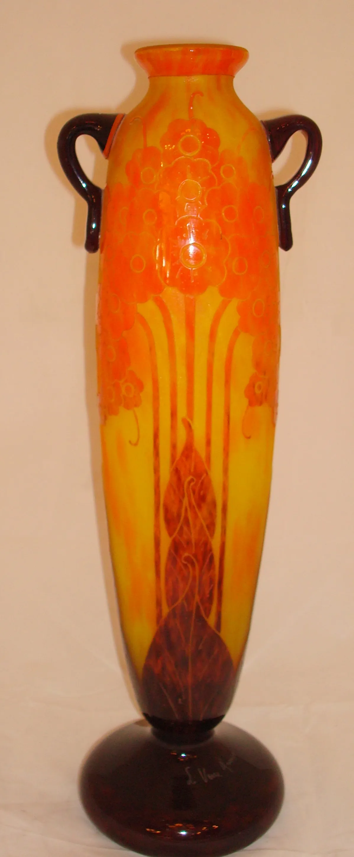 Antique vase made of signed Le Verre glass in warm tones