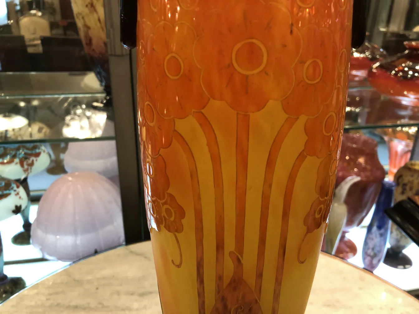 signed glass with orange and yellow flowers in antique style