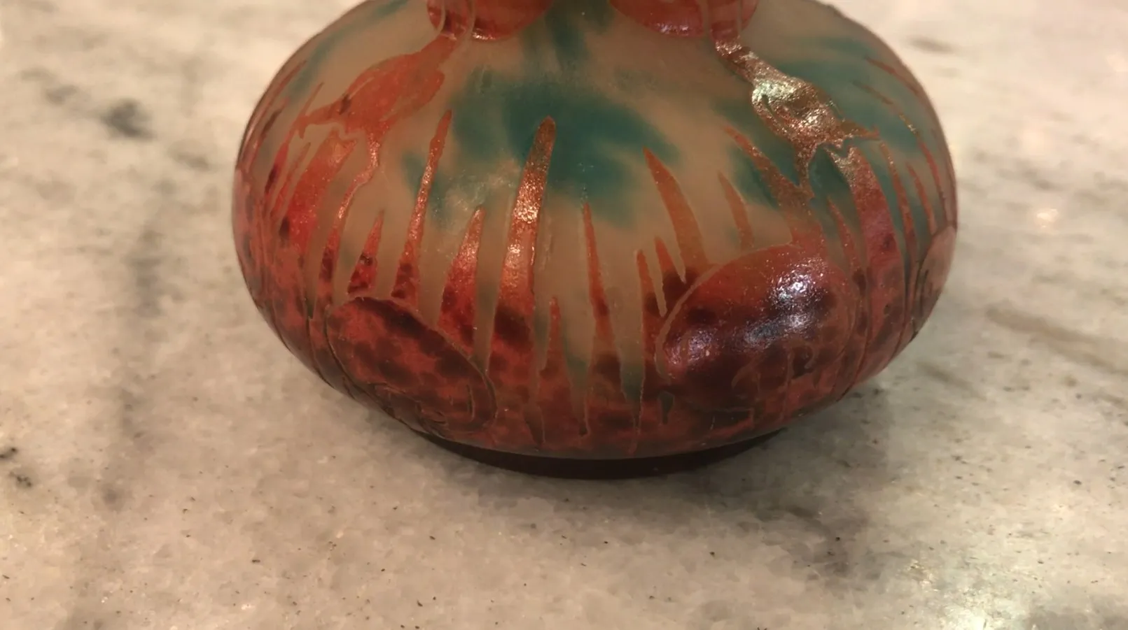 signed glass with red and green patterns, antique