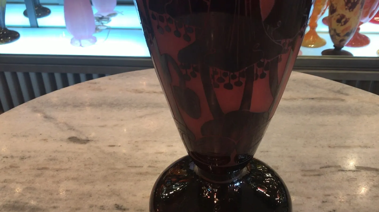 antique signed glass with dark and soft decorations, wide base