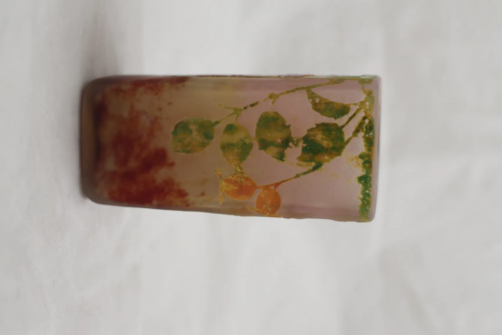 Signed glass Daum Nancy featuring decorative design with soft colors on light background.