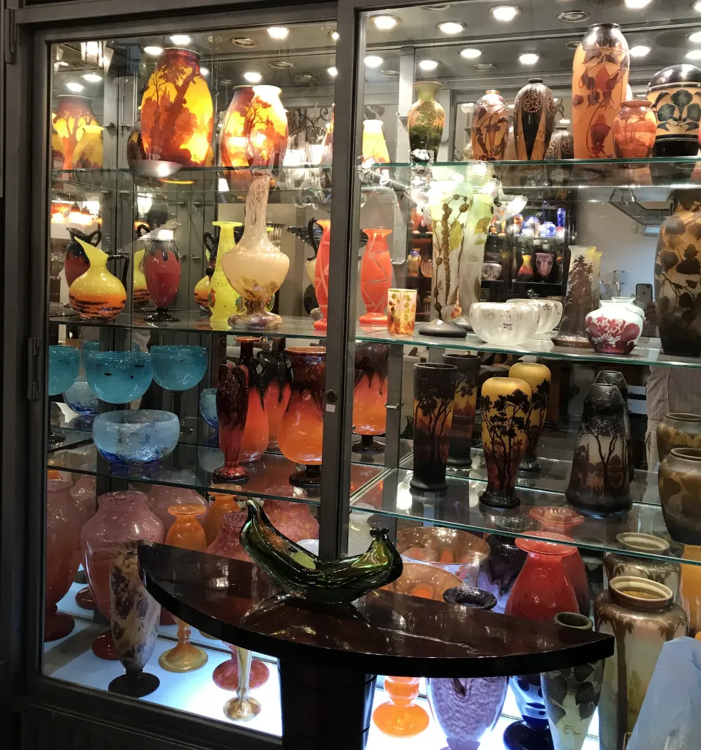 various vintage signed glass vases daum nancy on display