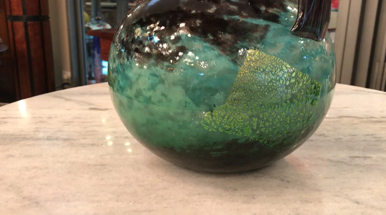 beautiful antique glass with green and black textures.