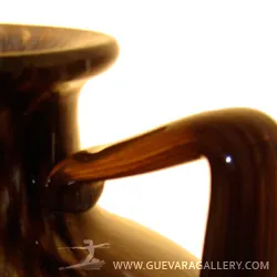 Detail of an antique with an elegant handle and distinctive shape