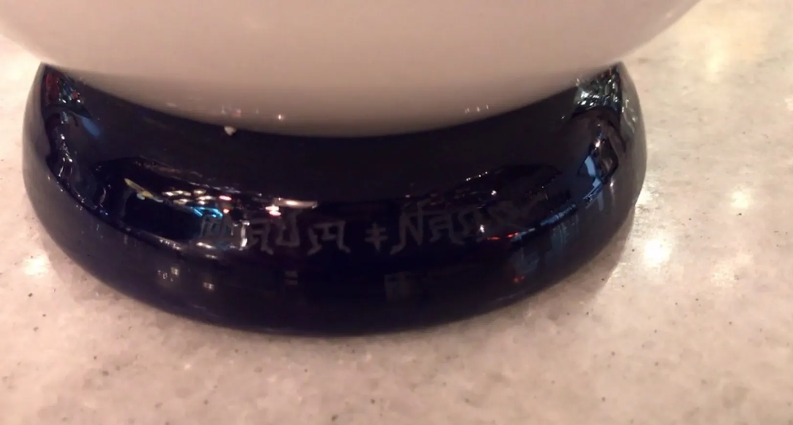 Antique signed glass by Daum Nancy, exhibiting elegant glossy base and light colors.