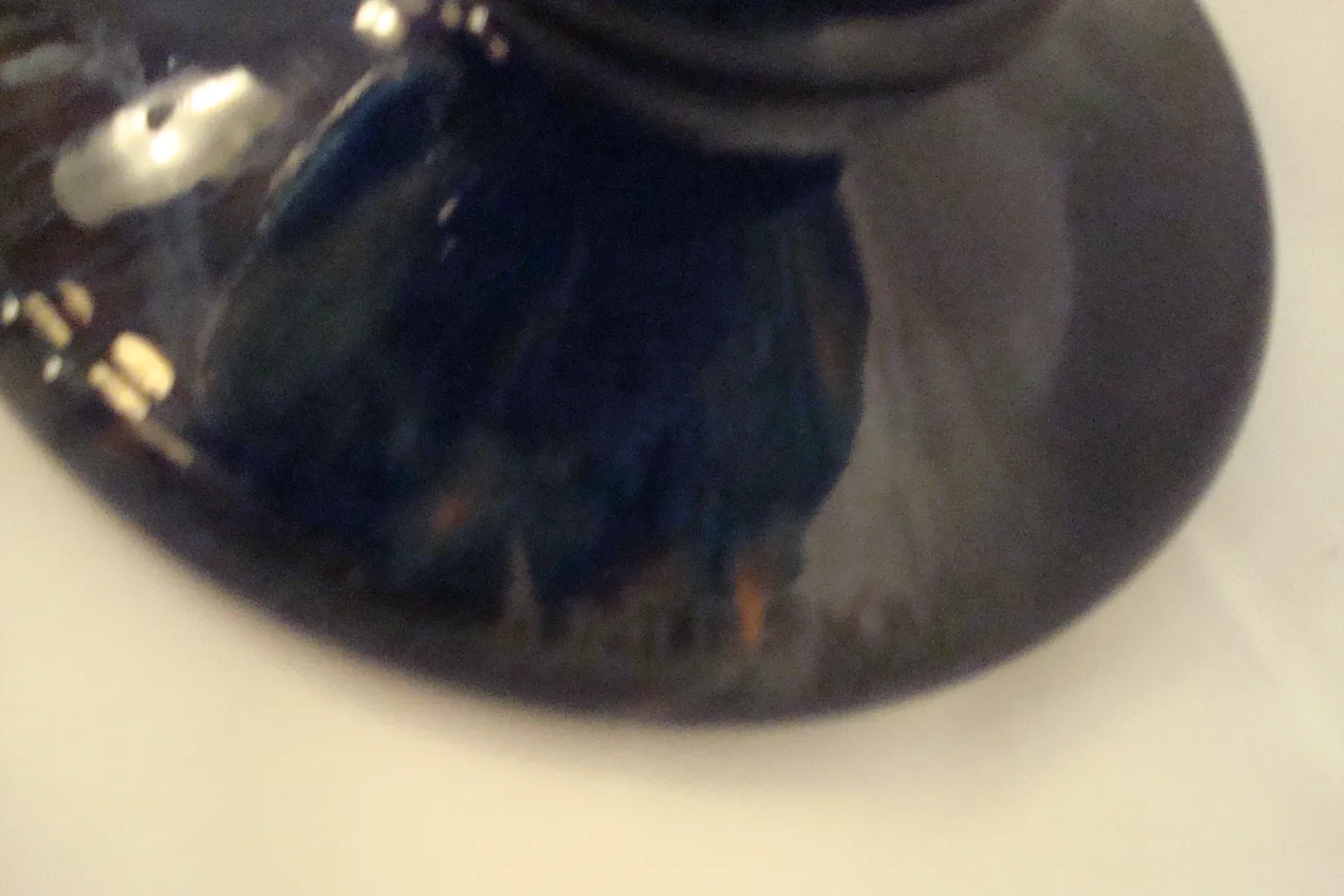 Detail of an antique signed glass Daum Nancy with vibrant colors