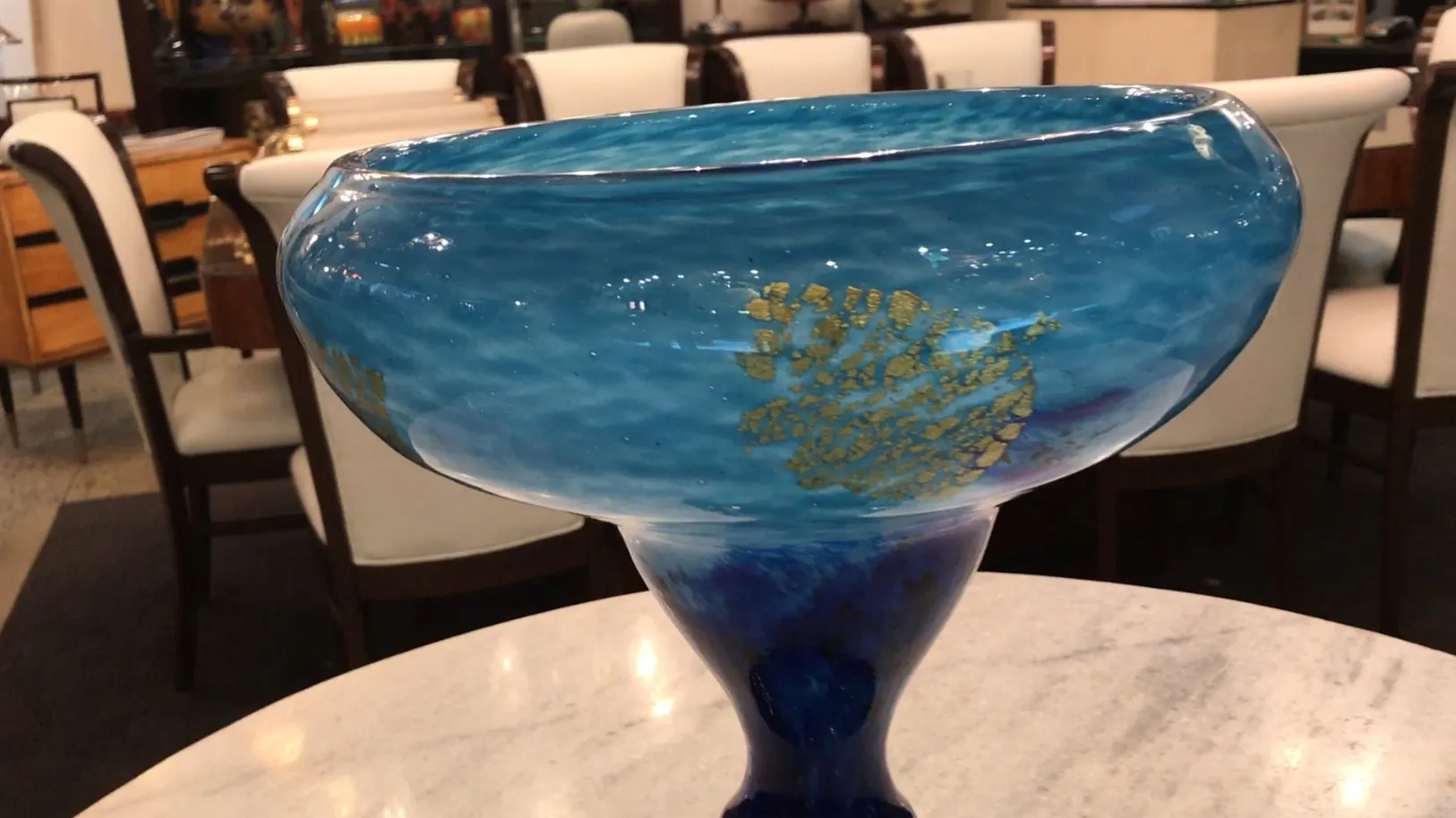 Blue signed glass Daum Nancy in a classy setting.