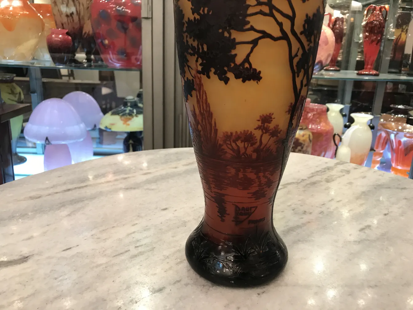 Antique glass featuring scenic design by Daum Nancy.