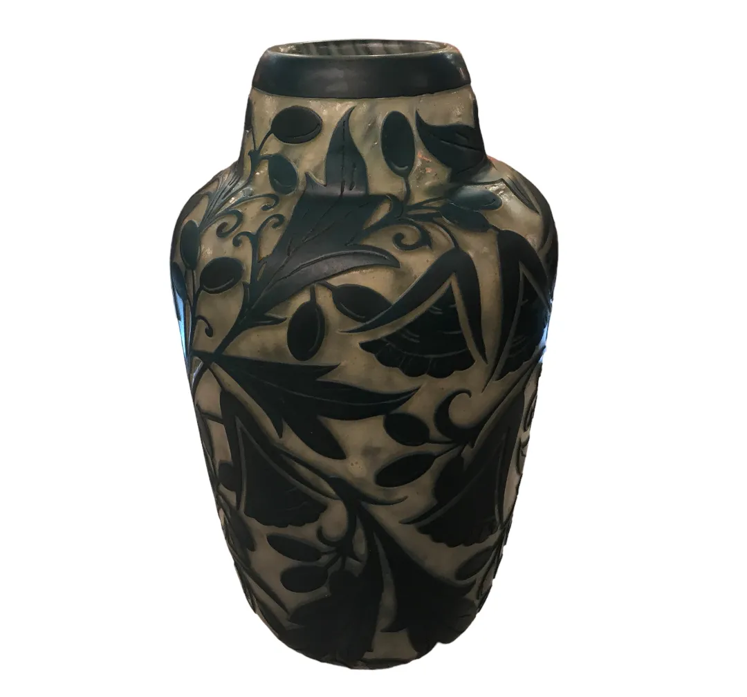 glass vase with botanical decorations and signature