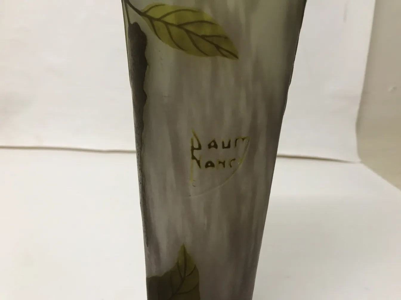 antique glass with green leaves and daum nancy signature