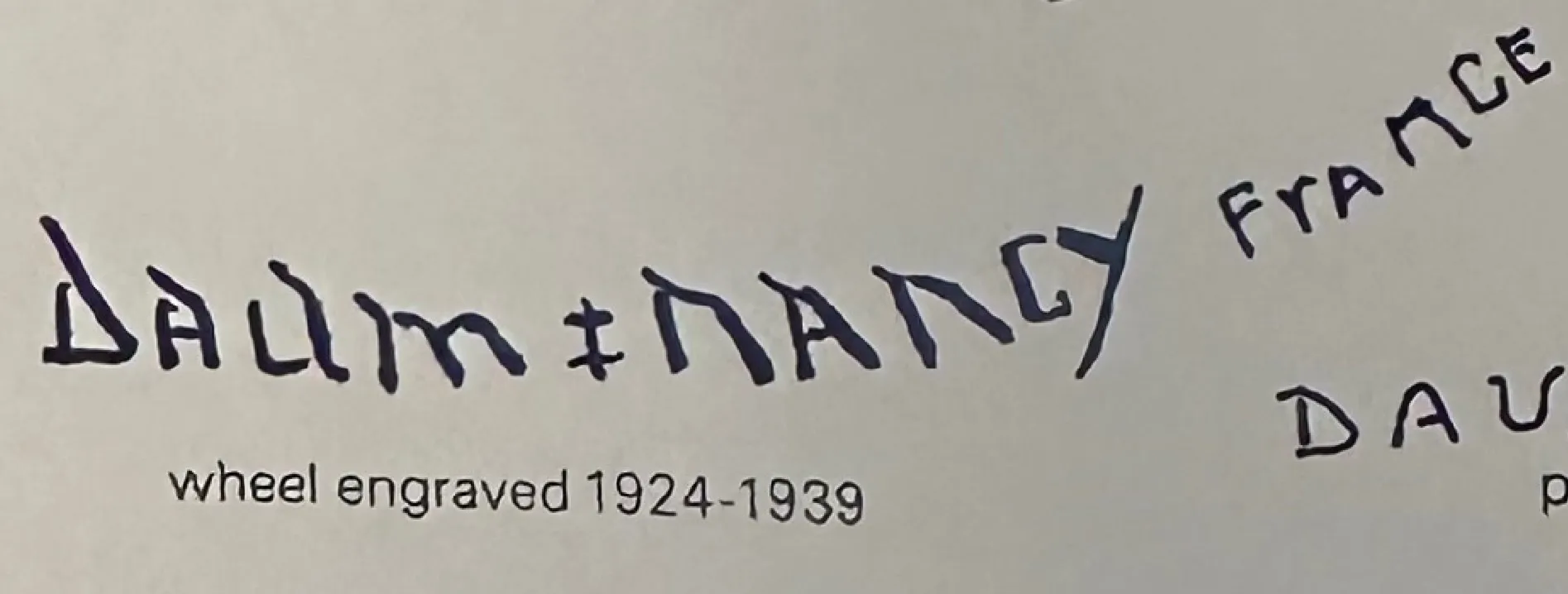 SIGNED GLASS Daum Nancy in white tone, with visible signature.