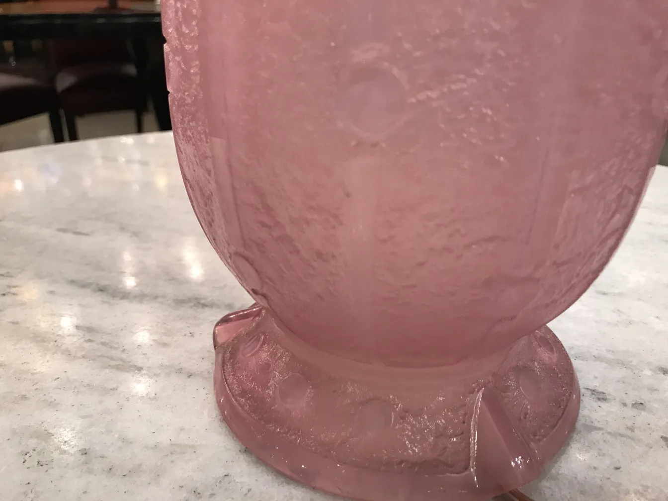 antique pink glass with signature on the bottom