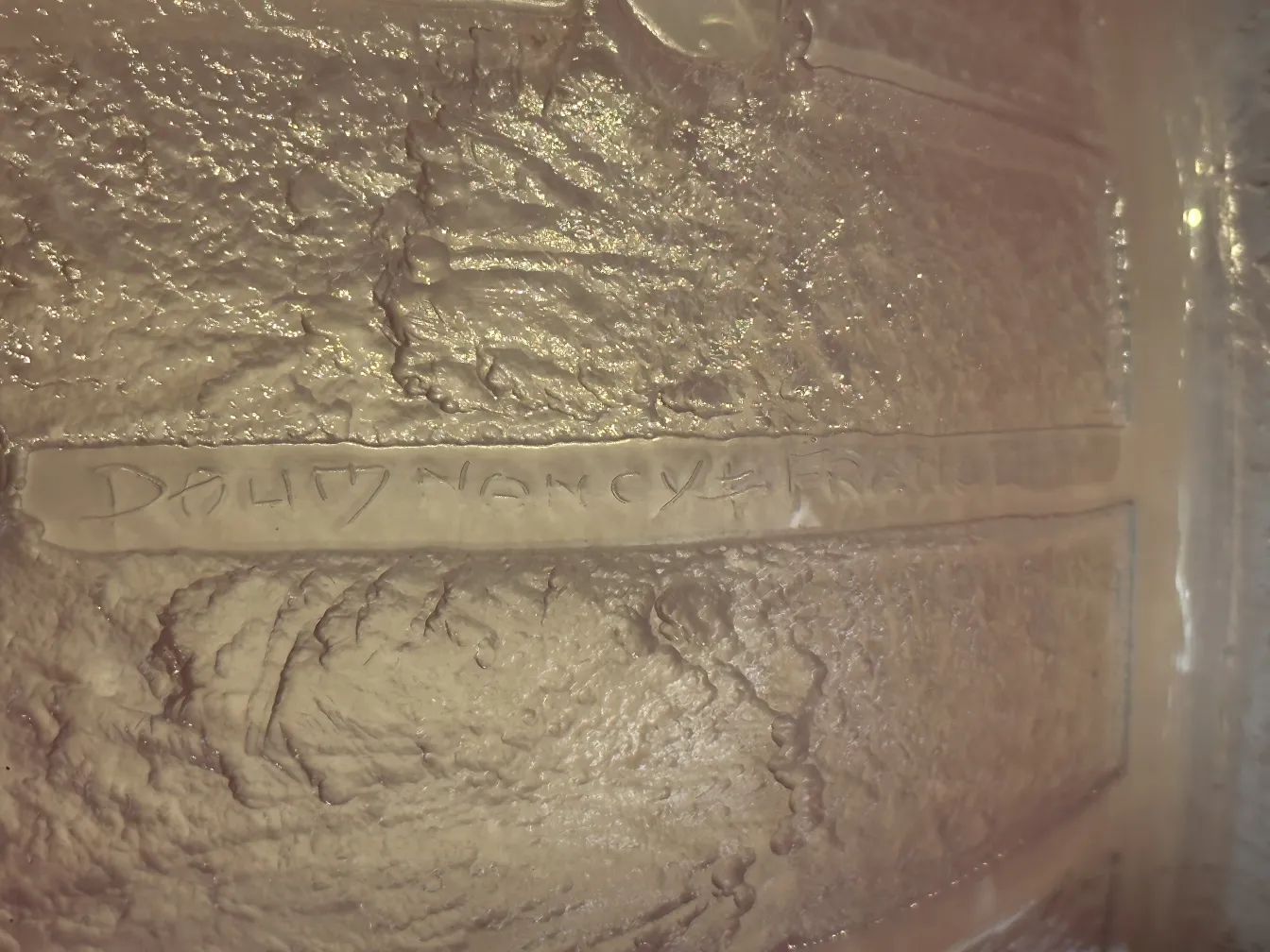 Antique signed glass Daum Nancy showcasing distinct texture.