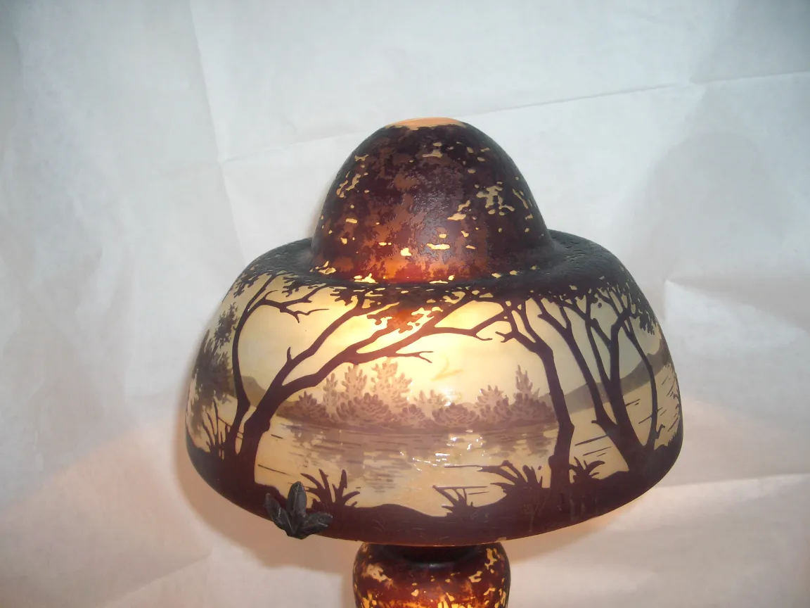 antique lamp made of signed glass with natural scenery