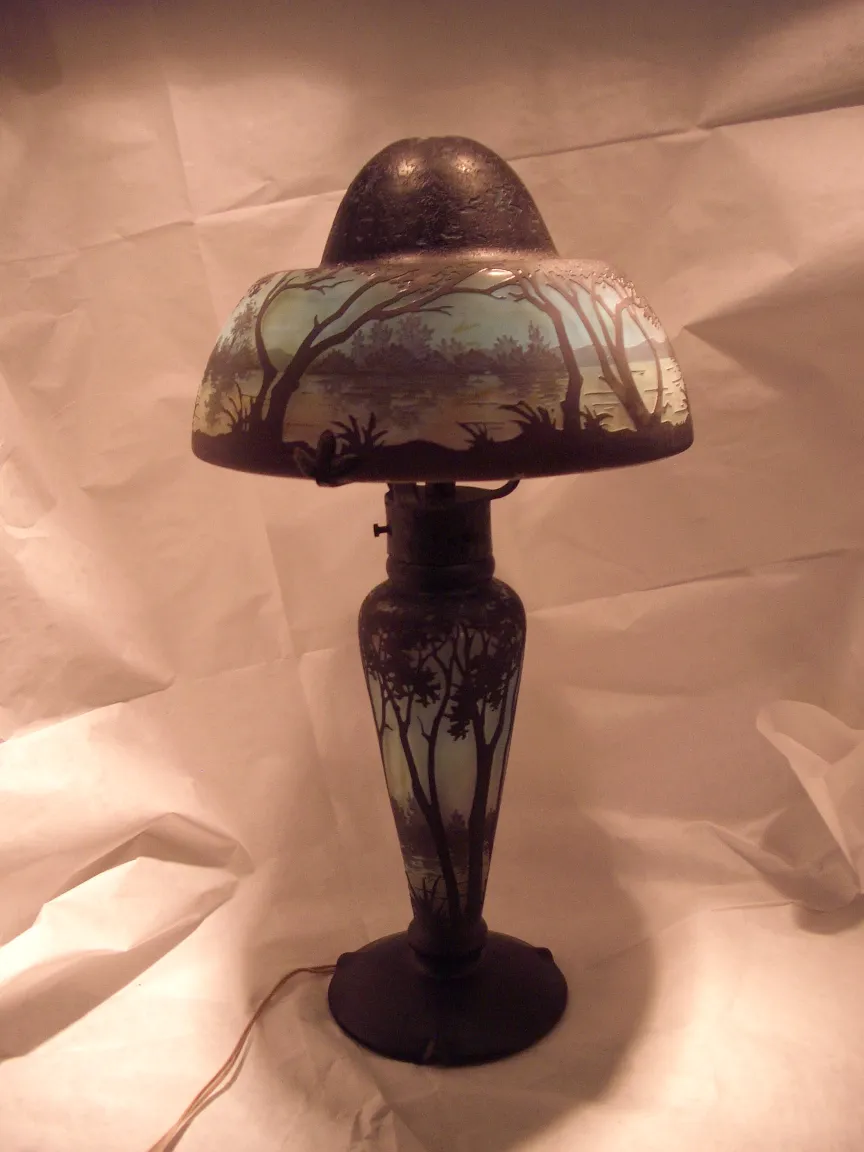 antique lamp with landscape design and decorative base