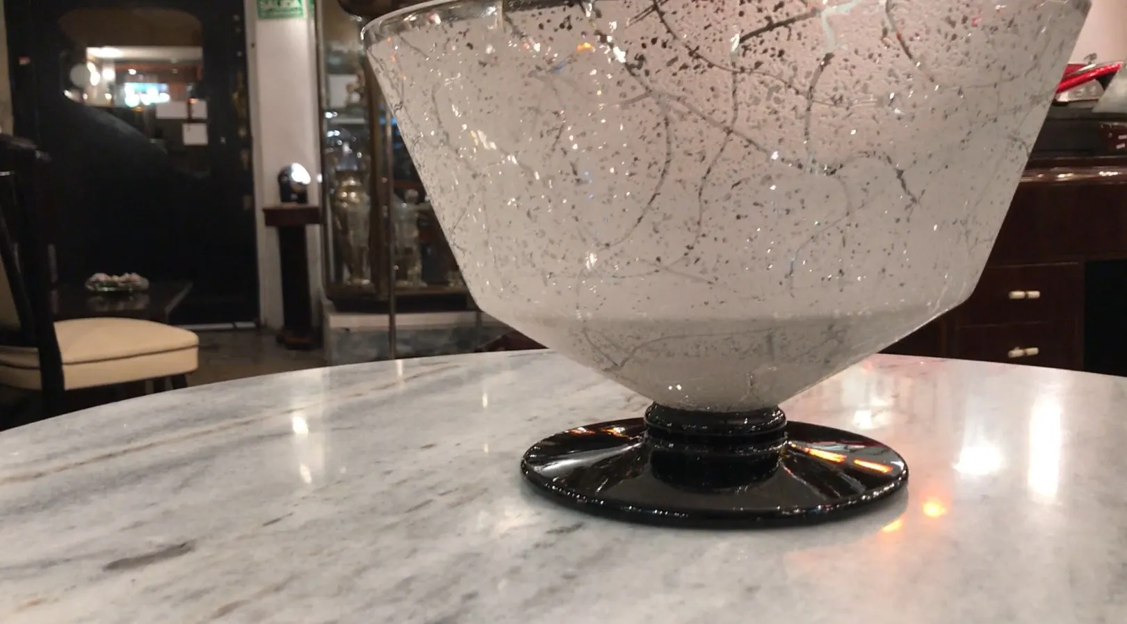 Glass with a black base and elegant design, antique Daum Nancy.