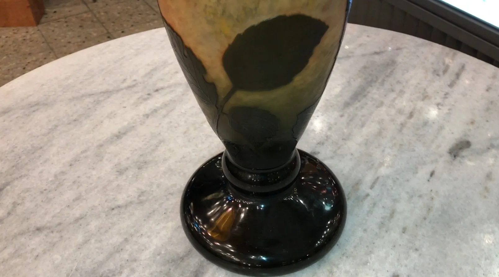 Antique signed glass with dark leaf decoration