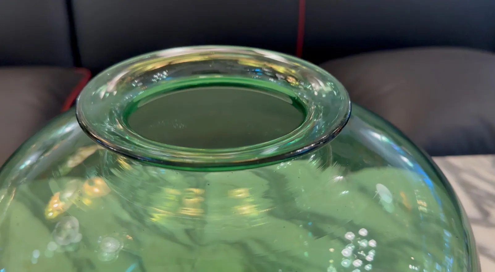 top view of an antique signed glass Daum Nancy with an elegant design and light green color.