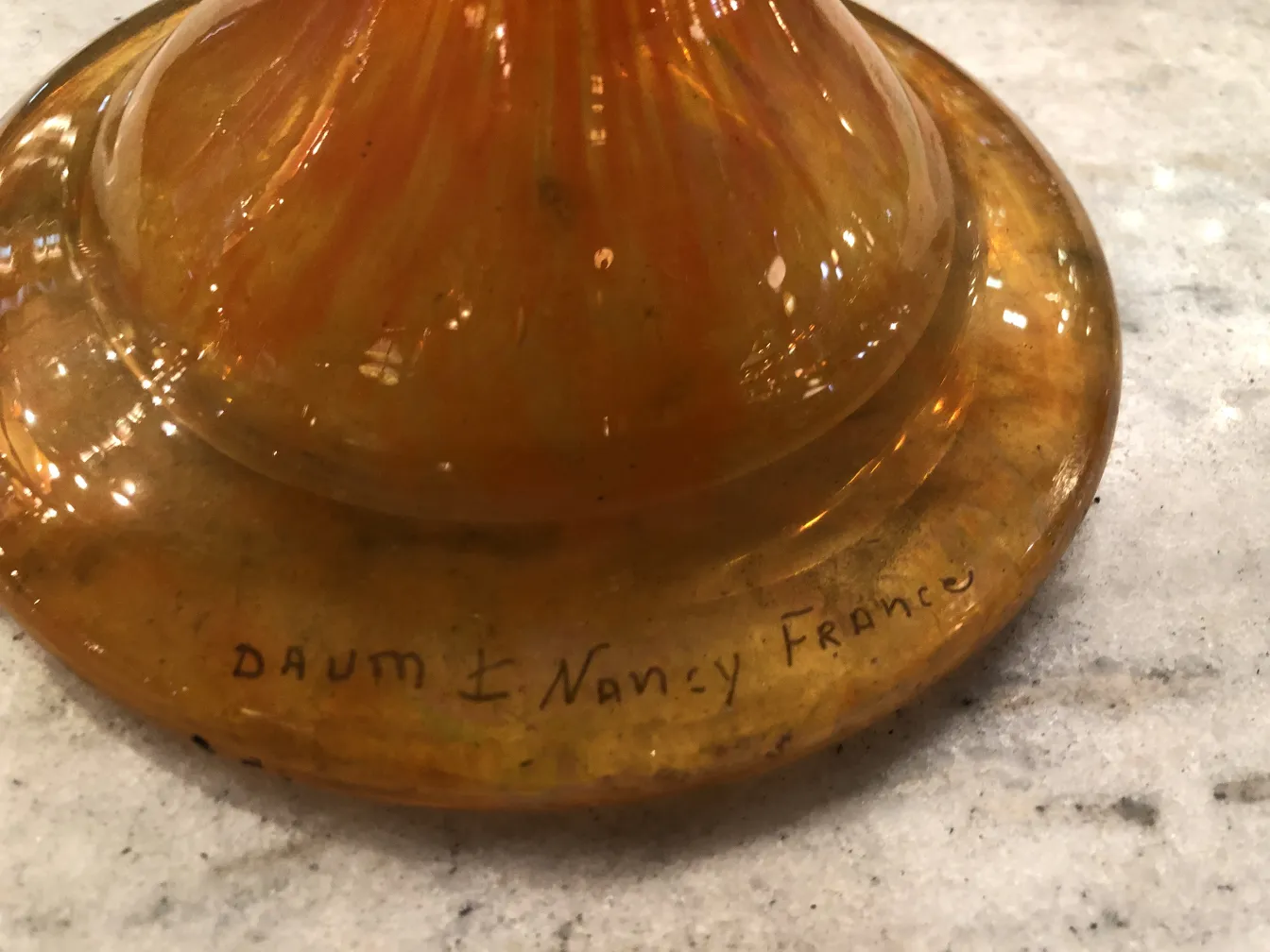 Antique glass signed Daum Nancy, warm yellow color and elegant ambiance.