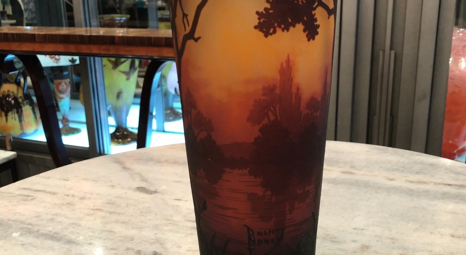 Signed glass Daum Nancy featuring landscapes and warm tones