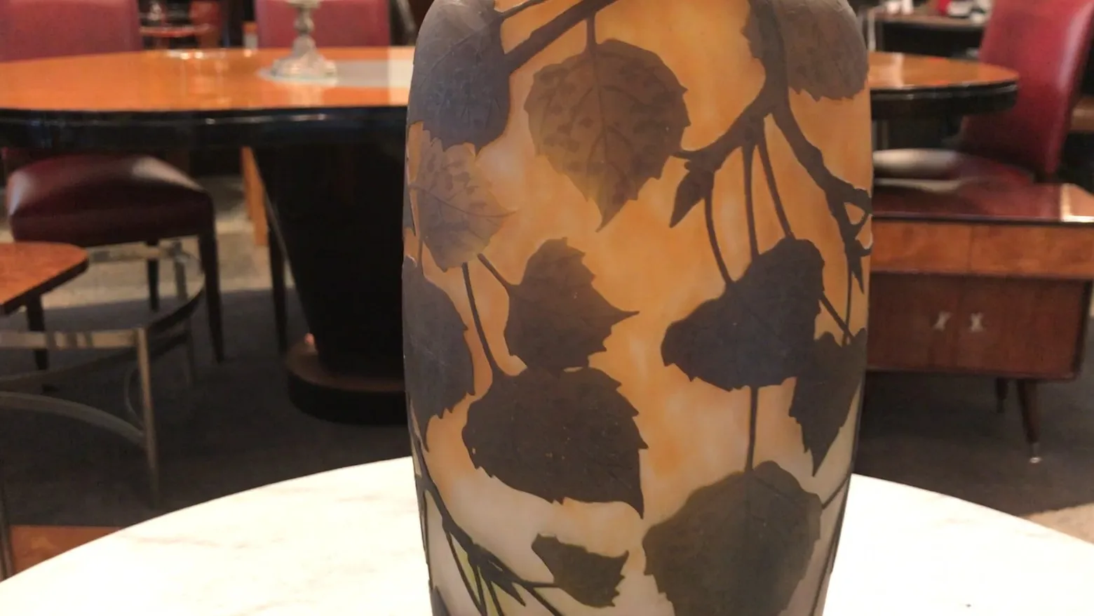 antique Daum Nancy vase with decorative leaves