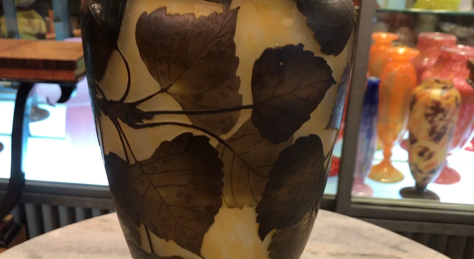 signed glass daum nancy featuring dark leaf design