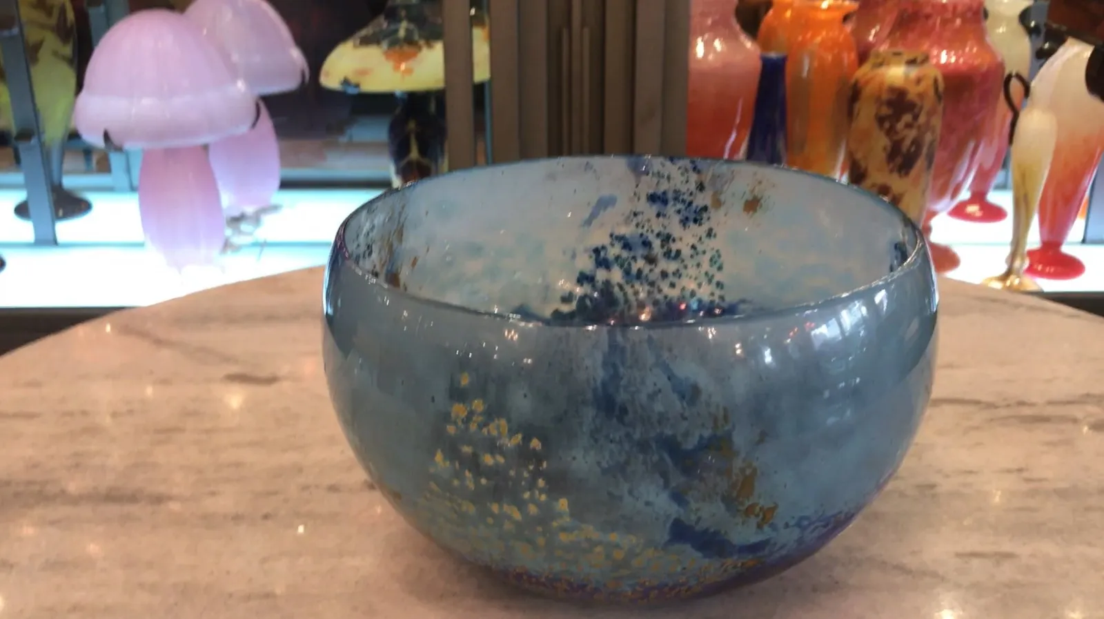 Antique decorative vase of signed Daum Nancy glass with light blue tones and artistic details