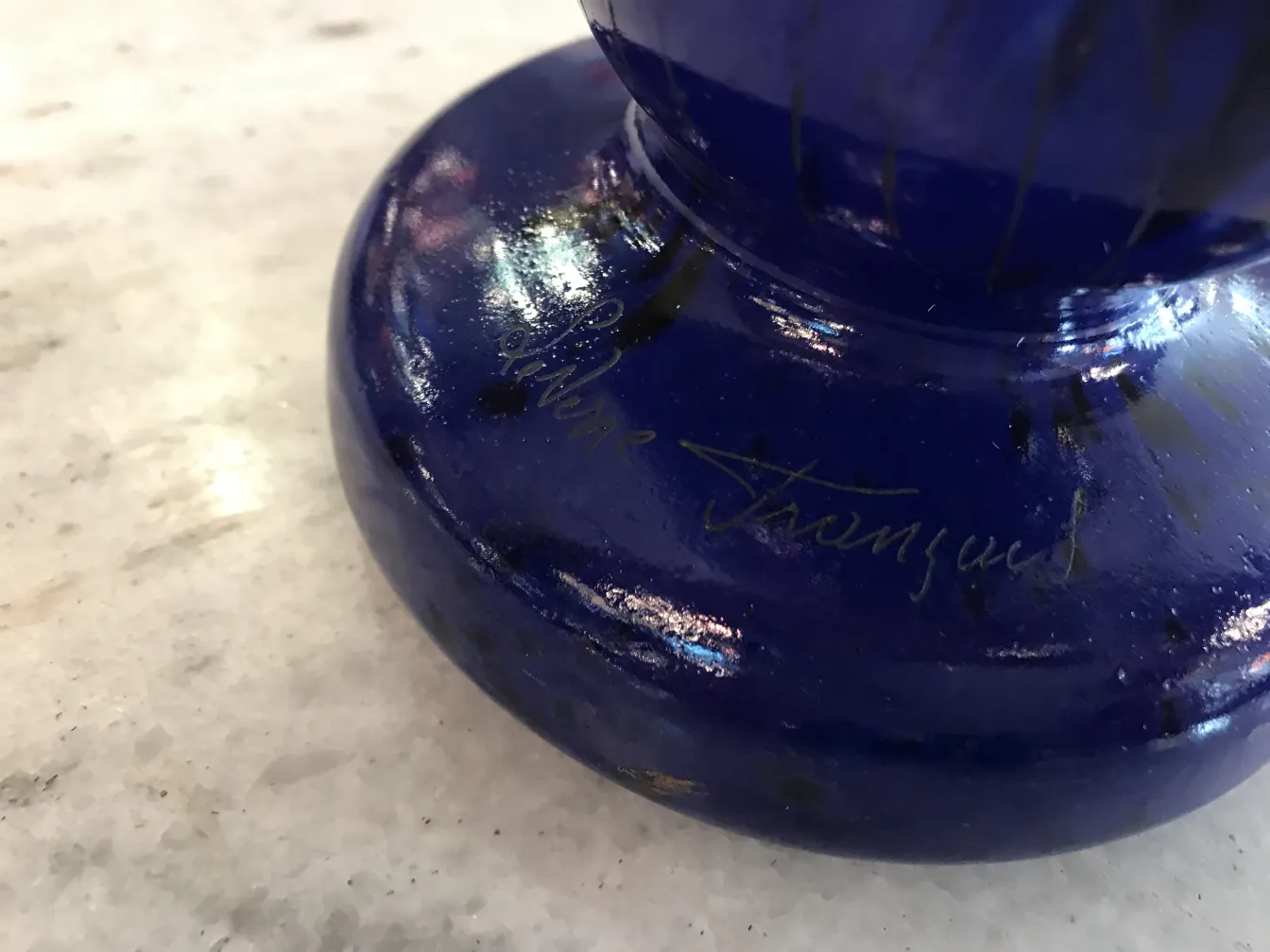 Signed blue glass Charder with signature detail, antique design
