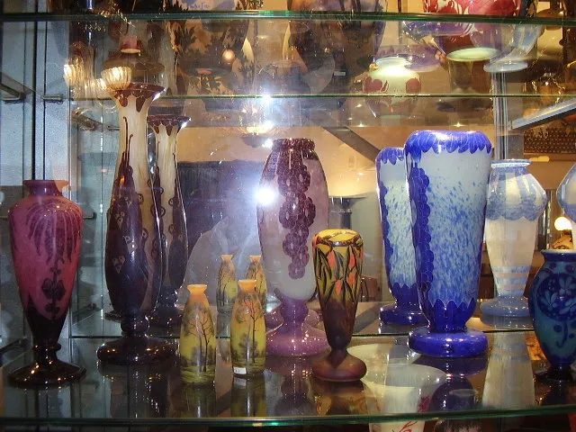 various glass vases on display shelf