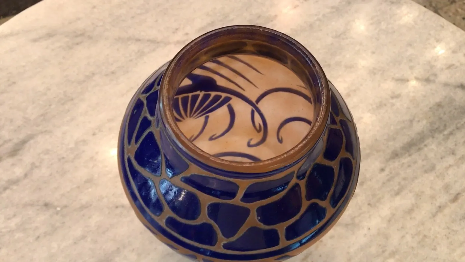 Antique signed glass Charder with blue and cream design.